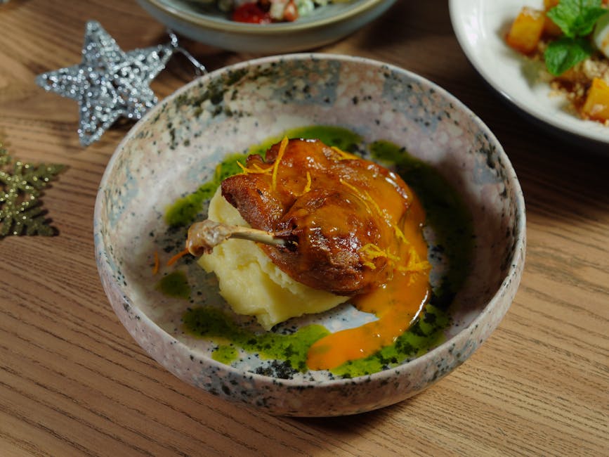 Foto de Confit de Pato con Salsa de Arándanos