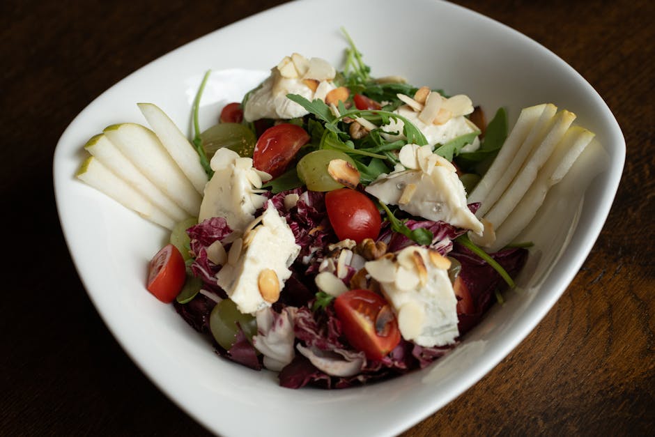 Foto de Ensalada de rúcula con queso y pera
