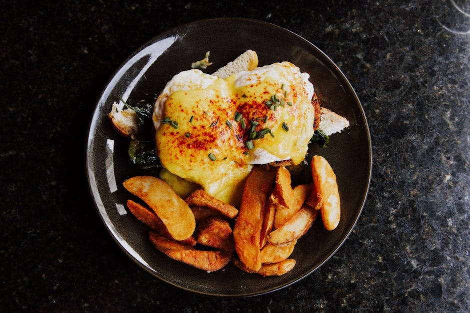 Foto de Huevos Rotos con Foie y Salsa Périgourdine