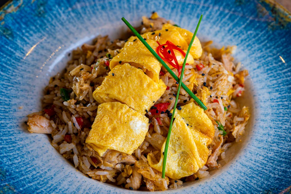 Foto de Kokotxas de Merluza y Bacalao con Arroz Frito