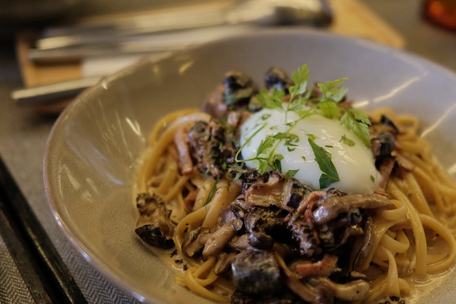 Foto de Pasta con Morcilla, Salsa de Maíz y Huevo Escalfado