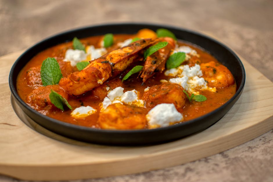Foto de Rape rebozado con salsa de tomate al azafrán